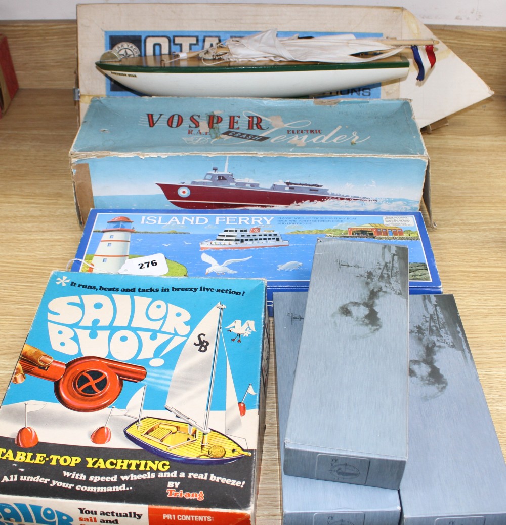 A boxed Star model pond yacht, a Tri-ang boxed Sailor Buoy table top yachting set, a Victory Industries plastic electric powered model